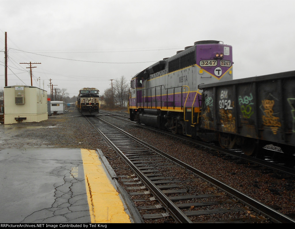 MBTA 3247 passing NS 9812